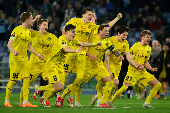 Bodo Glimt players celebrate during the penalty shoot-out of