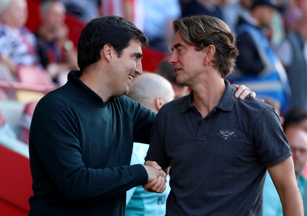 Tottenham boss Thomas Frank and Andoni Iraola