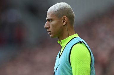 Richarlison warms up during the English Premier League football match between Liverpool and Tottenham