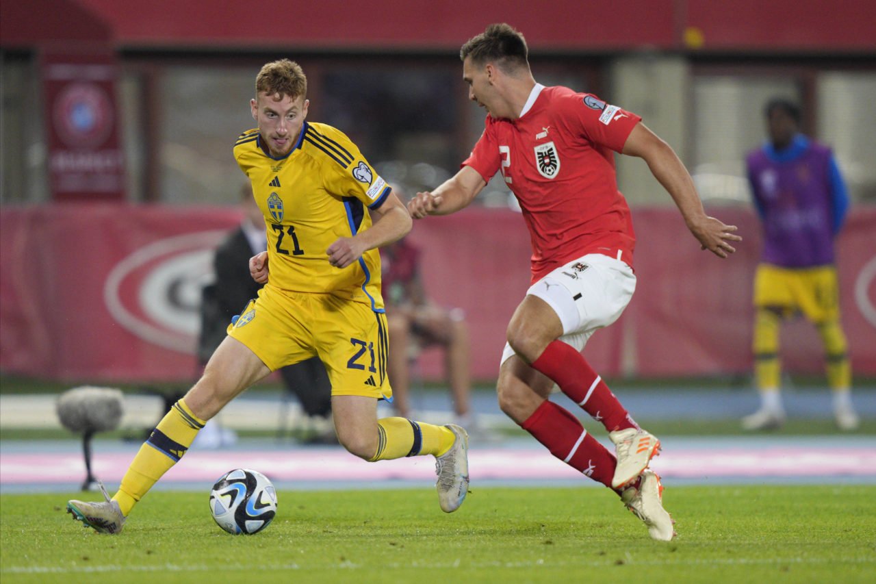 Dejan Kulusevski of Sweden and Maximilian Woeber of Austria during the UEFA EURO 2024 qualifying round group J match between Austria and Sweden