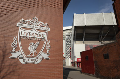 Liverpool FC club crest on a wall outside the Anfield