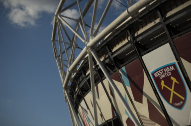 Exterior view of the London Stadium with West Ham United club badge
