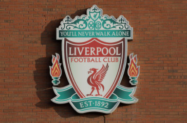 Liverpool FC club badge on a wall outside Anfield