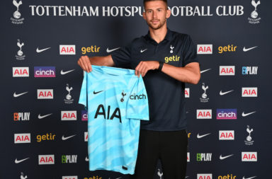 Guglielmo Vicario poses as he signs for Tottenham Hotspur