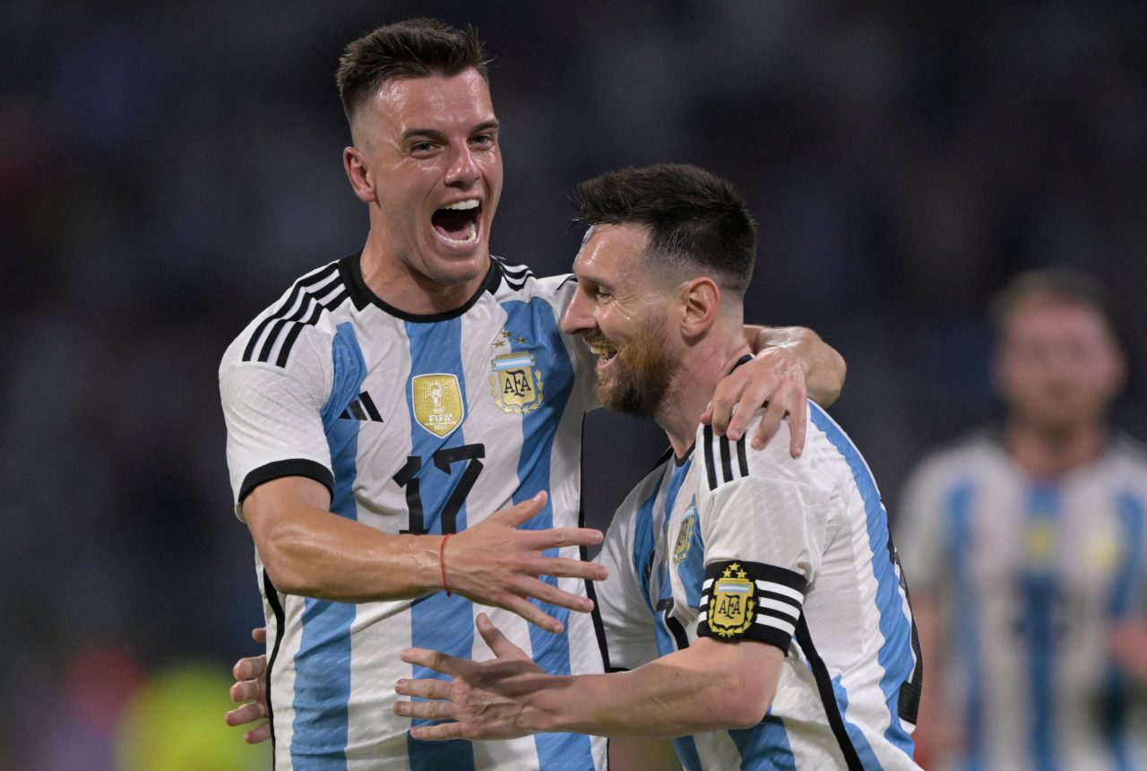 Giovani Lo Celso celebrates with Lionel Messi