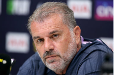 Ange Postecoglou looks on at a press conference